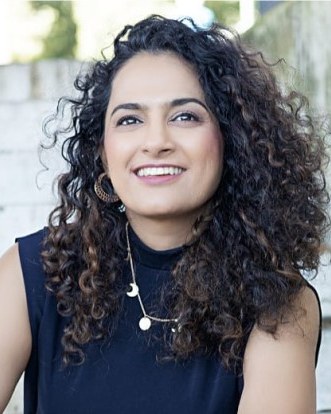 Harleen Oberoi, founder of MaiKa, smiling, with dark curly hair